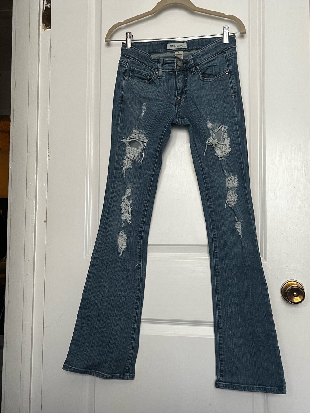 Ultra Low Rise Distressed Flared Jeans - Medium Blue